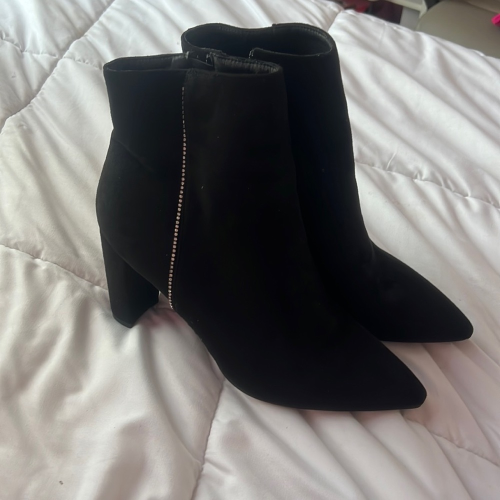 High heel boots. Slightly used, worn 2 or 3 times.